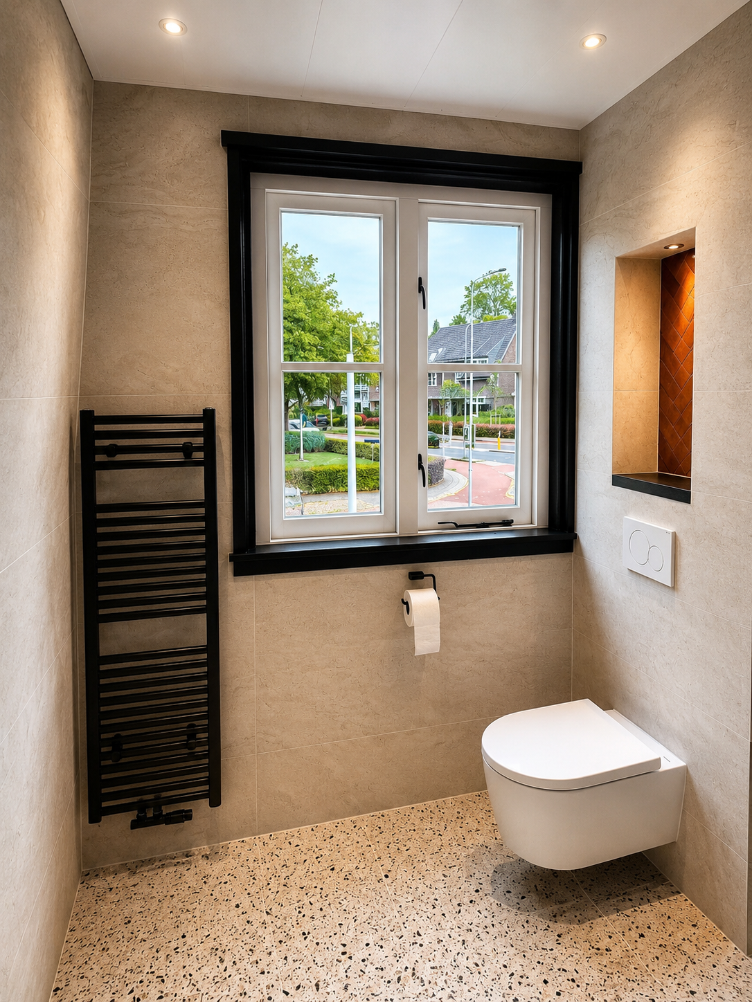 Toiletruimte met wandcloset, radiator en verlichte nis